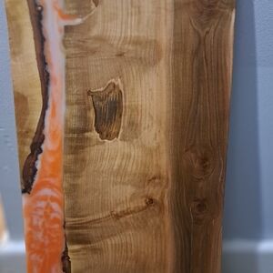 Wooden Slab with Orange Resin Inlay
